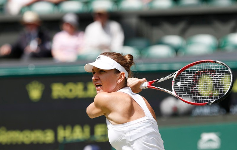 WIMBLEDON 2014: ^Simona Halep - Eugenie Bouchard 6-7 (5), 2-6. Românca a ratat finala, fiind învinsă și de durerile la gleznă
