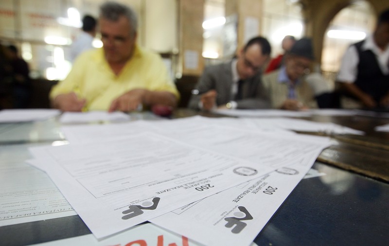 Proiectul privind amnistia evazioniştilor ajunge la vot final în Parlament. PNL: "Este un fel de Ordonanța 13"