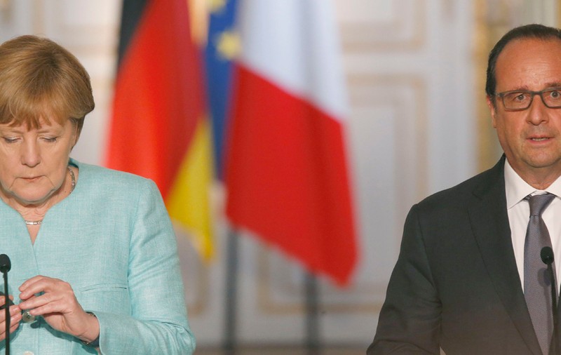 Hollande și Merkel, omagiu pentru victimele atentatelor de la Paris