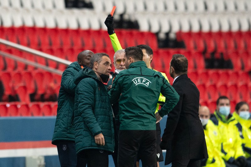 Pierre Webo member of Istanbul Team Staff speaking with Romanian 4th referee Sebastian Coltescu during the UEFA Champions League group H football match between Paris Saint-Germain (PSG) and Istanbul Basaksehir FK at the Parc des Princes stadium in Paris, on December 8, 2020. Paris Saint-Germain's decisive Champions League game with Istanbul Basaksehir was suspended today in the first half as the players walked off amid allegations of racism by one of the match officials in Paris, France on december 8, 2020. Photo by David Niviere/ABACAPRESS.COM