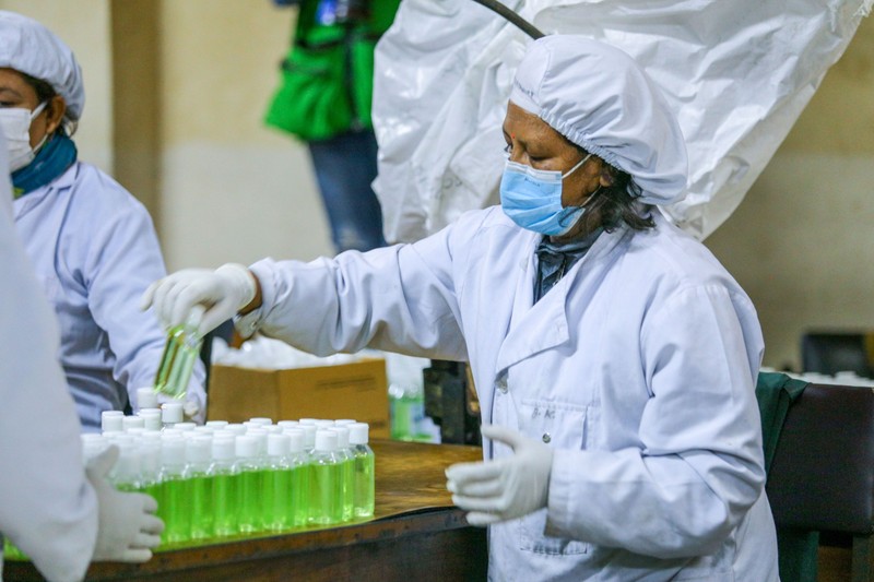 A worker arranges bottles of hand sanitizer at Nepal Aushadhi Limited a pharmaceutical company run by Nepal government during the twentieth day of nationwide lockdown..Nationwide lockdown is imposed by the government amid concerns about the spread of coronavirus disease (COVID-19) outbreak.