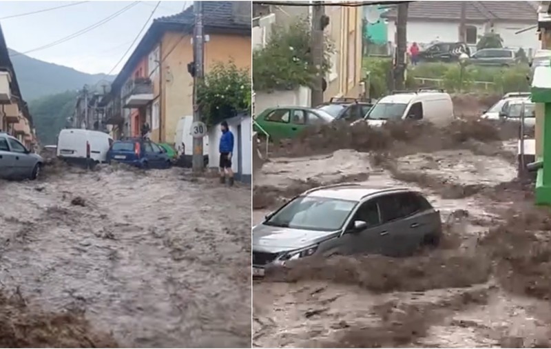Potop pe străzile din Reșița, după o ploaie torențială. Mai multe case au fost inundate. VIDEO