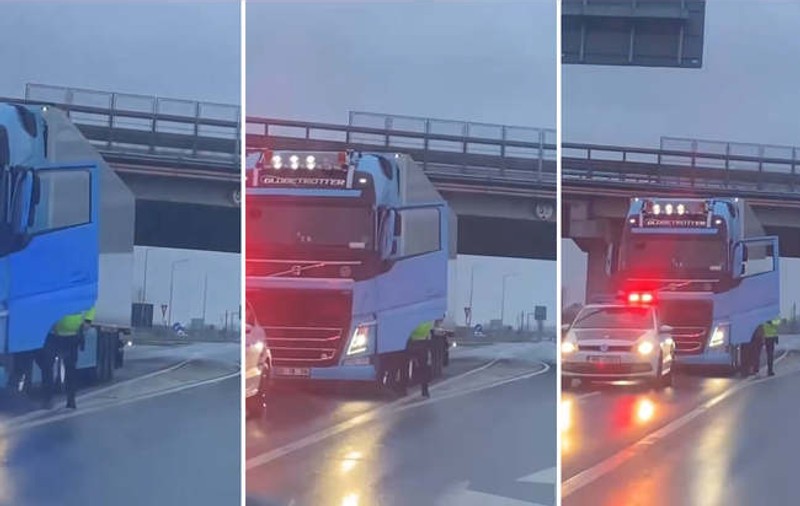 VIDEO | Polițist filmat în timp ce amenință cu pistolul un șofer de TIR tras pe dreapta. IPJ Arad anunță verificări
