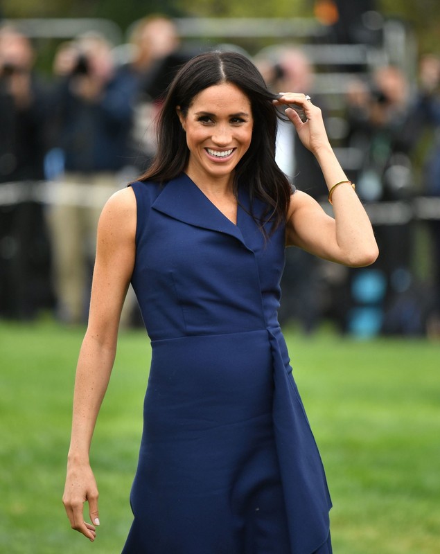 Ținuta care i-a scos în evidență burtica de gravidă lui Meghan Markle | FOTO