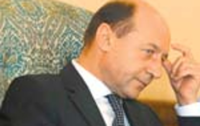 Basescu, decapitat