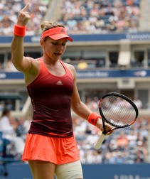 epa04922666 Simona Halep of Romania reacts as she plays Victoria Azarenka of Belarus during their quarterfinals match on the tenth day of the 2015 US Open Tennis Championship at the USTA National Tennis Center in Flushing Meadows, New York, USA, 09 September 2015. The US Open runs through 13 September, which is a return to a 14-day schedule. EPA/JOHN G. MABANGLO
