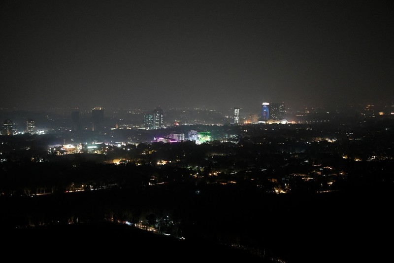 An aerial view shows Pakistan's capital Islamabad during a nationwide power outage on January 23, 2023. A massive power breakdown in Pakistan on January 23 affected most of the country's more than 220 million people, including in the mega cities of Karachi and Lahore.,Image: 751199615, License: Rights-managed, Restrictions: , Model Release: no