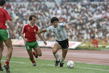 Argentina's Diego Maradona (R) fights for the ball with a Bulgarian player during the match of the 1986 Football World Cup Bulgaria vs. Argentina on June 10, 1986 at Mexico City.,Image: 686872485, License: Rights-managed, Restrictions: , Model Release: no