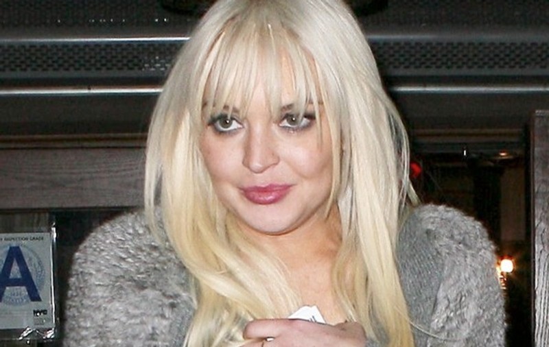 Lindsay Lohan se transformă în... purcică! Uite ce faţă buhăită are! | FOTO