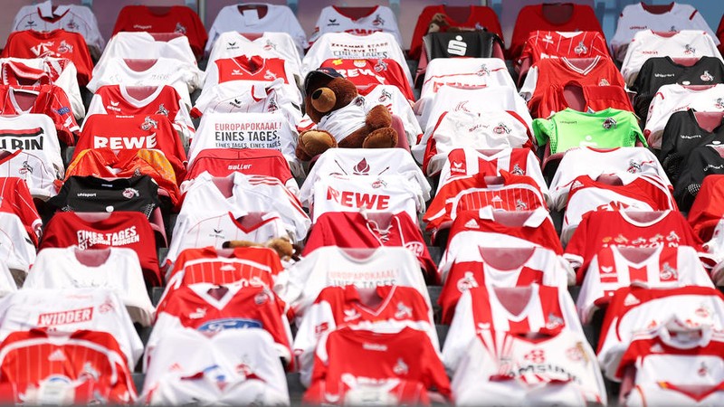 epa08427802 Seats on the tribune covered with team shirts seen ahead of the German Bundesliga soccer match between 1. FC Koeln and 1. FSV Mainz 05 at RheinEnergieStadion in Cologne, Germany, 17 May 2020. The German Bundesliga and Bundesliga Second Division are the first professional leagues to resume the season after the nationwide lockdown due to the ongoing Coronavirus (COVID-19) pandemic. All matches until the end of the season will be played behind closed doors. EPA-EFE/LARS BARON / POOL DFL regulations prohibit any use of photographs as image sequences and/or quasi-video.
