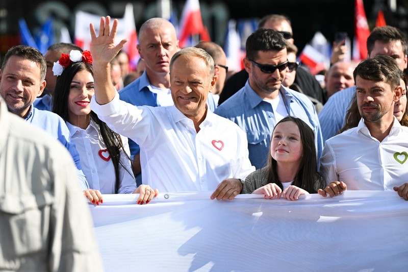 Opposition leader Donald Tusk, center, waves as he leads a march to support the opposition against the governing populist Law and Justice party in Warsaw, Poland, Sunday, Oct. 1, 2023. Polish opposition leader Donald Tusk seeks to boost his election chances for the parliament elections on Oct. 15, 2023, leading the rally in the Polish capital.,Image: 809971193, License: Rights-managed, Restrictions: This content is intended for editorial use only. For other uses, additional clearances may be required., Model Release: no, Pictured: Donald Tusk