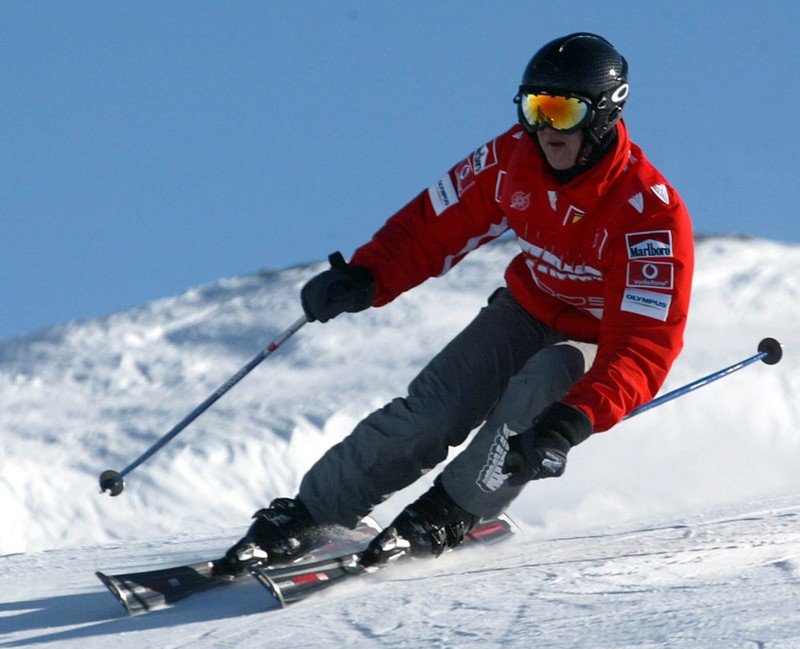 epa04538645 (FILE) A file picture dated 14 January 2005 shows German then Formula One driver Michael Schumacher in action during a ski race in the ski resort Madonna di Campiglio, Italy. One year after his skiing accident at a French Alps resort on 29 December 2013, former seven-times Formula One champion Schumacher is still recovering from a head injury sustained in the accident. EPA/BENVENUTI