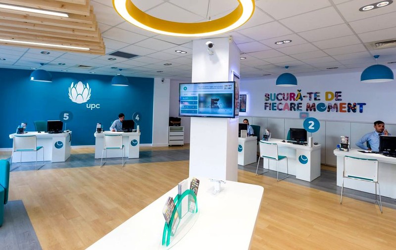 ANALIZĂ / Ce înseamnă cumpărarea UPC de către Vodafone pentru România