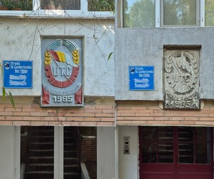 Colaj cu stemele UTC lângă plăcuța cu numele străzii după erou-martir al Revoluției, Gavrilov Corneliu