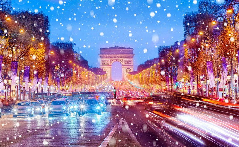 Arch of Triumph and Champs Elysees in Paris at night, France