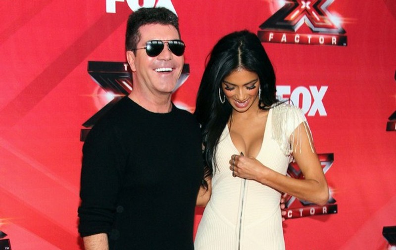Nicole Scherzinger, ruşinată de propriul decolteu? | FOTO