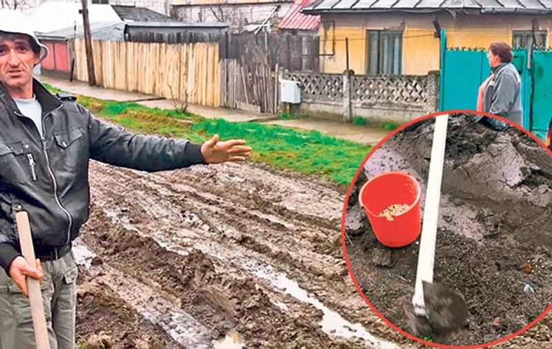 Sădesc porumb pe stradă! Furia s-a transformat în resemnare! Pentru că autorităţile nu le-au asfaltat şoseaua, câţiva ploieşteni fac haz de necaz