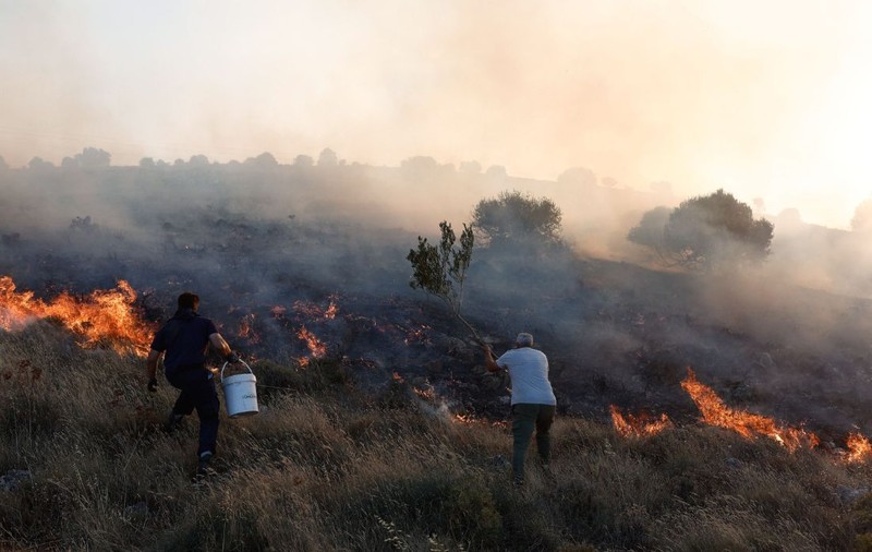 O femeie din Georgia este acuzată că a pornit incendiile devastatoare din Grecia: „A fost prinsă în fapt”