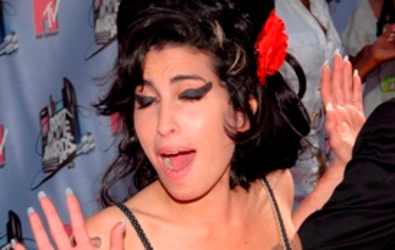 Amy Winehouse crede că soţul ei seamănă cu Nelson Mandela