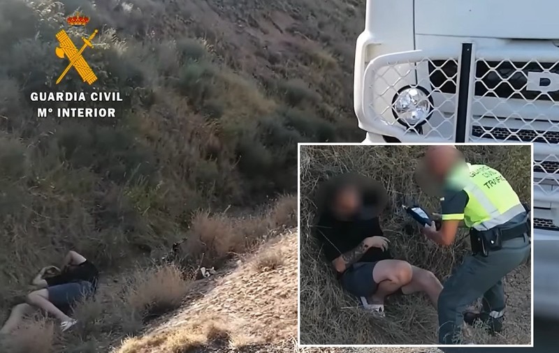 Șofer de camion, rupt de beat într-un șanț, în Spania. Nu putea să stea în picioare ca să sufle în etilotest | VIDEO