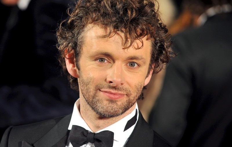 Michael Sheen vrea să intre în pielea lui John Lennon 