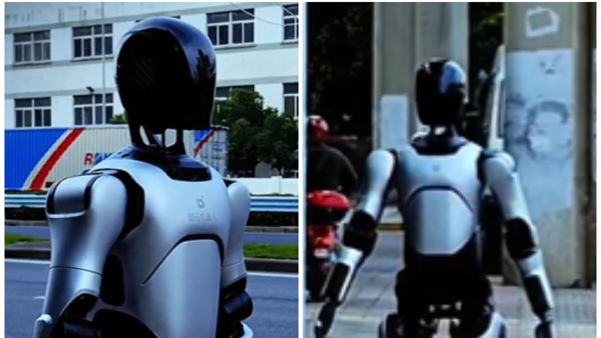 Un robot umanoid în timp ce merge pe șosea.