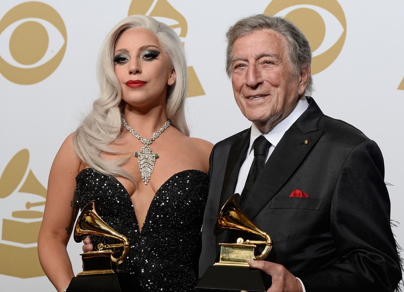 epa04610999 Lady Gaga (L) and Tony Bennett (R) hold the awards for 'Best Traditional Pop Vocal Album' awards at the 57th annual Grammy Awards held at the Staples Center in Los Angeles, California, USA, 08 February 2015. EPA/PAUL BUCK