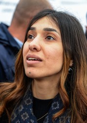 Iraqi Yazidi and Nobel Peace Laureate Nadia Mourad attends the exhumation of a mass-grave of hundreds of Yazidis killed by Islamic State (IS) group militants in the northern Iraqi village of Kojo in Sinjar district on March 15, 2019. Iraqi authorities exhumed the mass grave in an operation aiming to extract remains and identify victims of an August 2014 massacre of Yazidis by IS fighters as they entered the village of Kojo, during investigations of genocide against the decimated minority.,Image: 419827651, License: Rights-managed, Restrictions: , Model Release: no