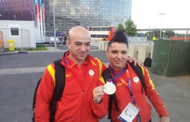 Roxana Cocoș, mândră de medalia de argint luată la Olimpiada din 2012, de la Londra. Antrenorul Nicolae Nițu i-a fost alături