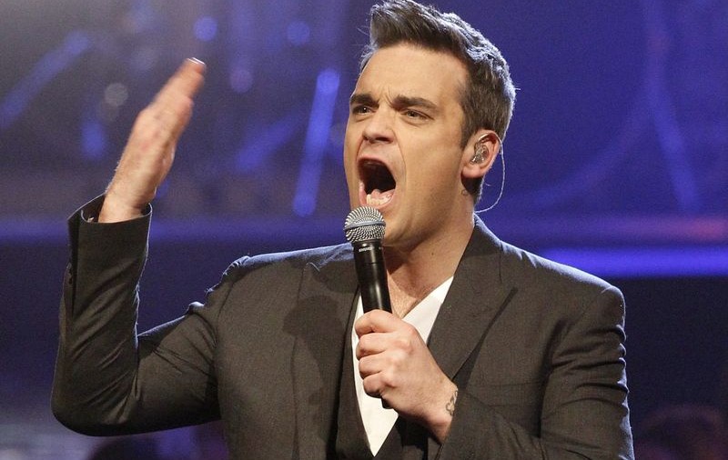Robbie Williams s-a întors oficial în Take That 