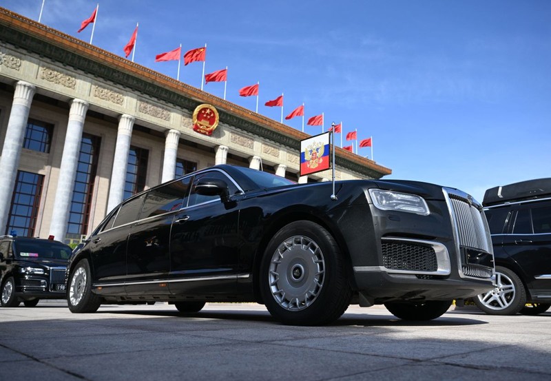 8538039 18.10.2023 The Aurus Senat Limousine of the Russian President Vladimir Putin's motorcade is parked outside the Great Hall of the People before an opening ceremony of the 3rd Belt and Road Forum for International Cooperation, at the Great Hall of the People in Beijing, China. Dmitriy Azarov / POOL