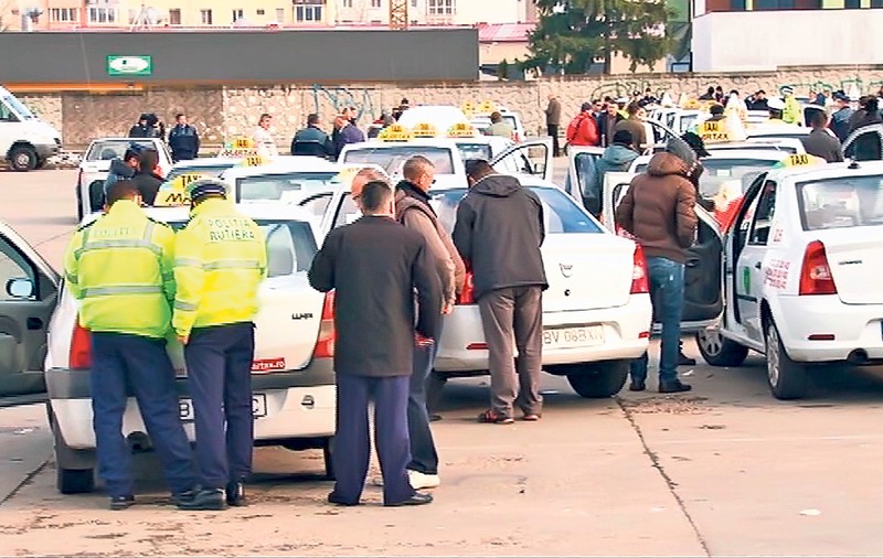 Saci de bani din taximetrie