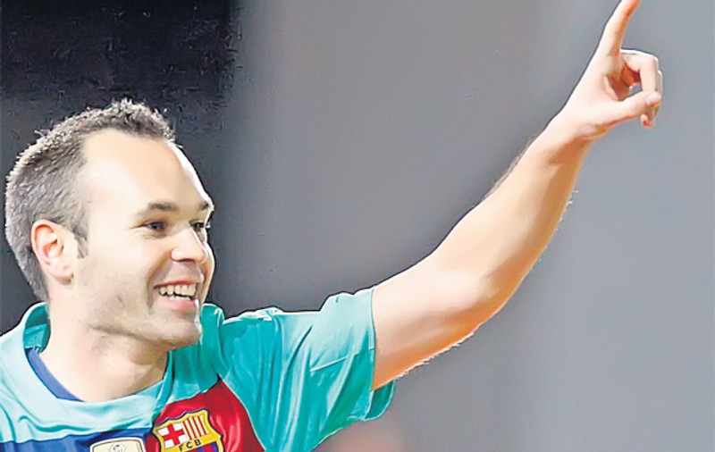Andres Iniesta, campionul mondial de la Barcelona, a făcut «Bodega SRL» cu români