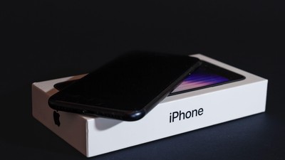 Picture of an Apple Iphone SE3 on a black background. The third-generation iPhone SE (also known as the iPhone SE 3 or the iPhone SE 2022) is a smartp