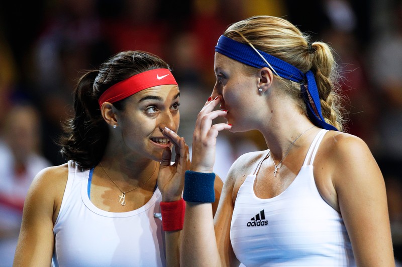 epa05630253 Caroline Garcia (L) and Kristina Mladenovic (R) of France react during their doubles match against Barbora Strycova and Karolina Pliskova of the Czech Republic at the Fed Cup Tennis World Group final between France and the Czech Republic at the Rhenus Sport stadium in Strasbourg, France, 13 November 2016. EPA/YOAN VALAT