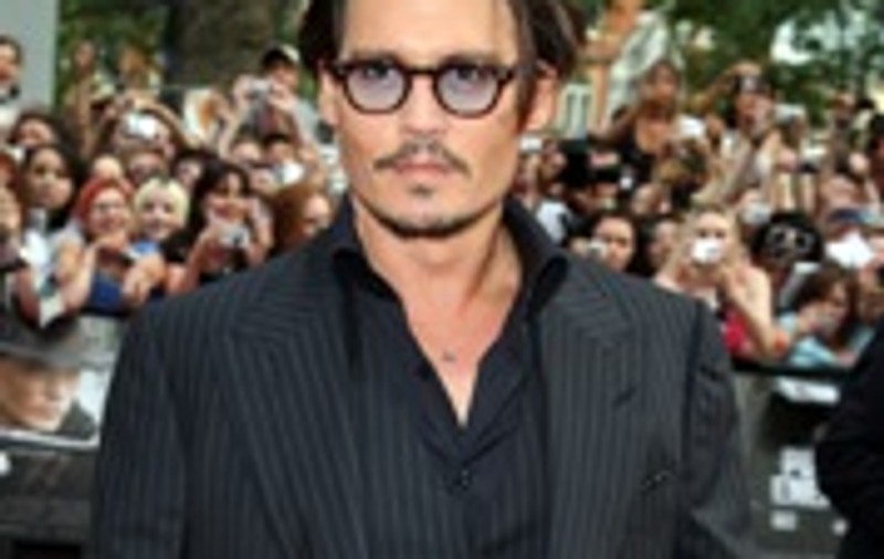 Relaxare cu vin roşu à la Johnny Depp