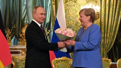 Angela Merkel și Vladimir Putin.