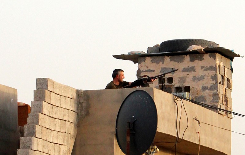 500 de oameni UCIŞI de organizaţia TERORISTĂ ISIS, în Irak! FEMEI ŞI COPII, ÎNGROPAŢI DE VII!