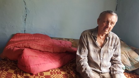 Gheorghe pe marginea patului său