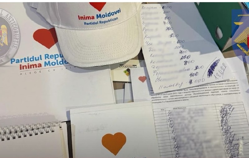 Zeci de percheziţii într-un dosar de finanţare electorală ilegală în Rep. Moldova. Viceprimarul din Comrat, reţinut împreună cu alte trei persoane suspectate de coruperea alegătorilor