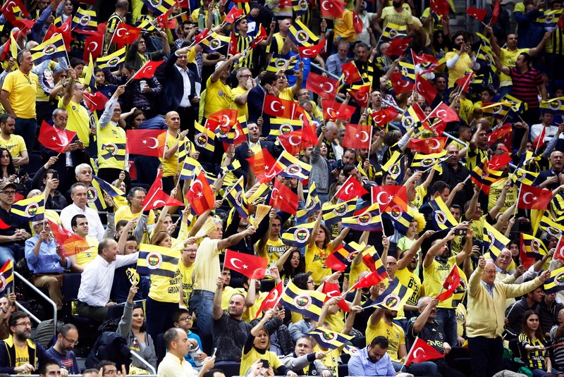 epa05927745 Fenerbahce fans cheer for their team during the Euroleague Playoff round 3 basketball match between Fenerbahce Istanbul and Panathinaikos Superfoods Athens at Ulker Sports Arena in Istanbul, Turkey, 25 April 2017. EPA/CEM TURKEL