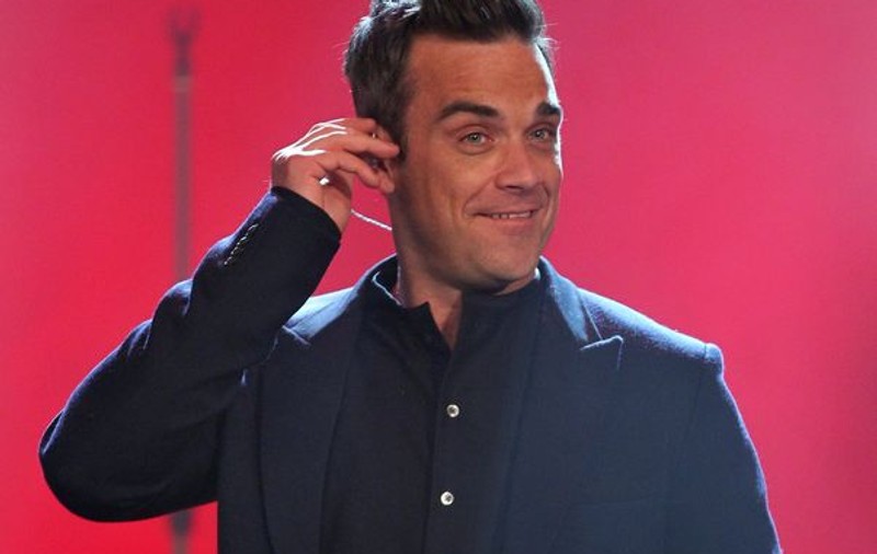 Robbie Williams nu mai are telefon mobil de 5 ani. Vezi de ce!