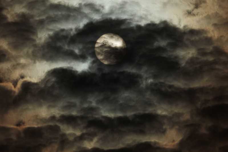 epa03251483 The planet Venus is pictured as it crosses the partially cloud covered face of the Sun, during a rare celestial event in New Delhi, India, 06 June 2012. Astronomy enthusiasts all over the world looked to the skies to watch the planet Venus crawl across the face of the sun in a rare celestial spectacle that will not happen again for more than a century. Venus appeared as a small black dot on the massive surface of the sun as it passed directly between the Earth and the centre of the solar system in its last transit in this century. EPA/ANINDITO MUKHERJEE