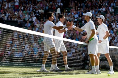 epa04842860 (L-R) Jean-Julien Rojer of the Netherlands and Horia Tecau of Romania celebrate winning the Men's doubles final match against John Peers of Australia and Jamie Murray of Britain during the Wimbledon Championships at the All England Lawn Tennis Club, in London, Britain, 11 July 2015. EPA/FACUNDO ARRIZABALAGA EDITORIAL USE ONLY/NO COMMERCIAL SALES