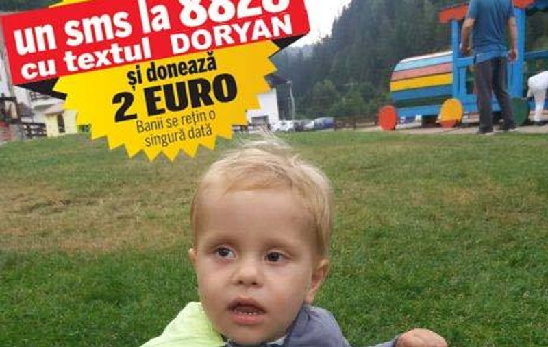 Micuțul Doryan are nevoie de 15.000 de euro pentru a lupta cu cancerul la cap. Din cauza zecilor de tumori, băiețelul de aproape 3 ani a rămas fără vedere acum un an