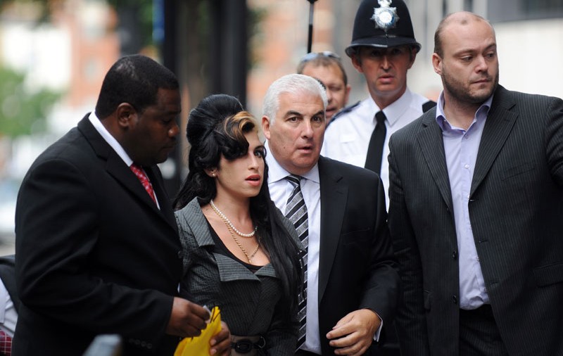 Amy Winehouse, la proces pentru lovirea unui fan în faţă