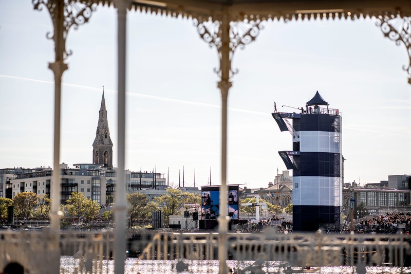 Constantin Popovici of Romania prepares to launch and armstand dive from the 27 metre platform at Dun Laoghaire Harbour during the final competition day of the second stop of the Red Bull Cliff Diving World Series in Dublin, Ireland on May 12, 2019.