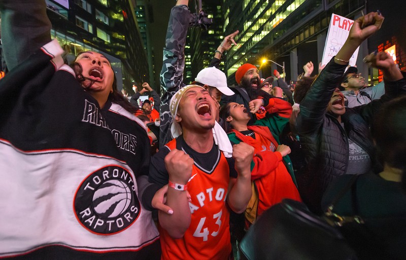 epa07647054 Toronto Raptors fans celebrate after the Raptors defeated the defending NBA Champions Golden State Warriors to win their first NBA Championship, in Toronto, Canada, 13 June 2019. EPA-EFE/WARREN TODA SHUTTERSTOCK OUT