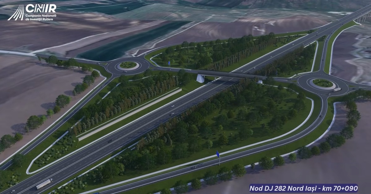 Această randare aeriană prezintă un nod rutier complex pe Autostrada Unirii A8, situat la intersecția cu drumul județean DJ 282, la km 70+090 la nord de Iași, evidențiind o structură pe două niveluri cu un pod central ce traversează coridorul autostrăzii cu două benzi pe sens, două sensuri giratorii pe rampele superioare pentru fluidizarea traficului de conexiune și o separare clară a fluxurilor rutiere