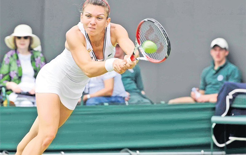 Tenismena Simona Halep îşi cumpără haine după fiecare turneu important